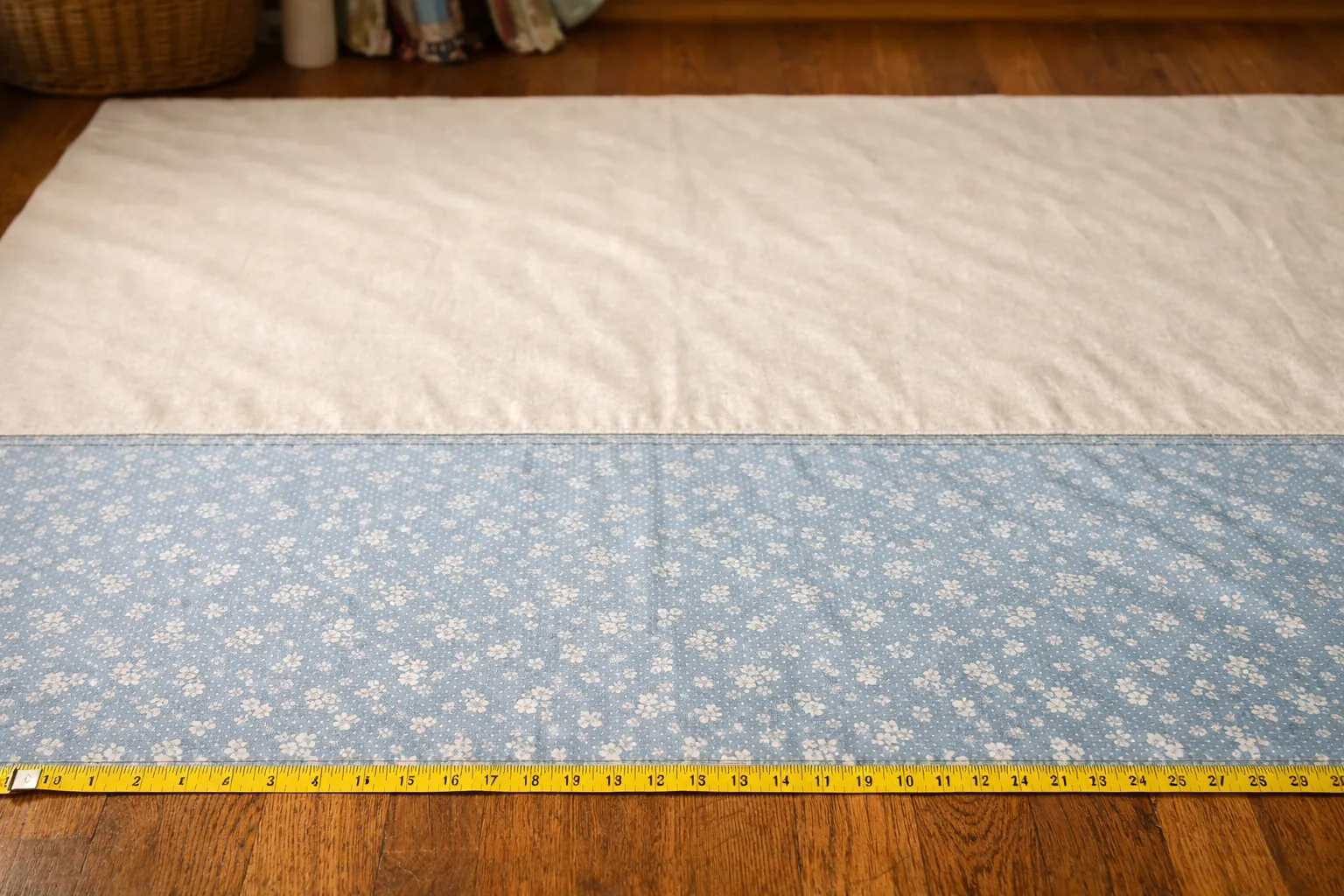 Two lengths of quilting cotton sewn together with one horizontal seam to make a backing