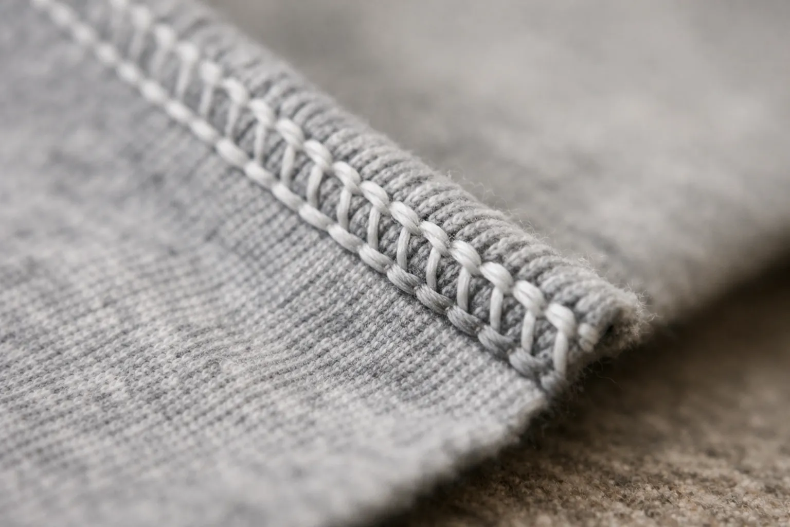 A balanced four-thread overlock seam on knit fabric